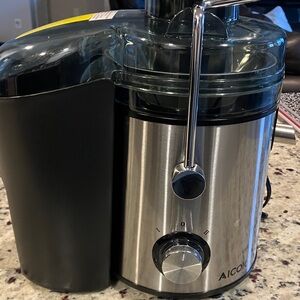 Stainless Steel Juicer with Black Accents